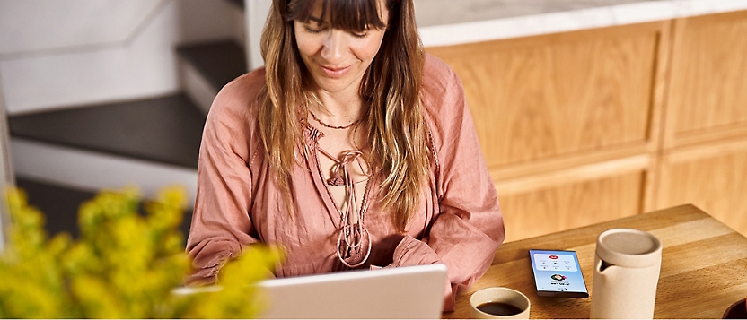a women watching laptop