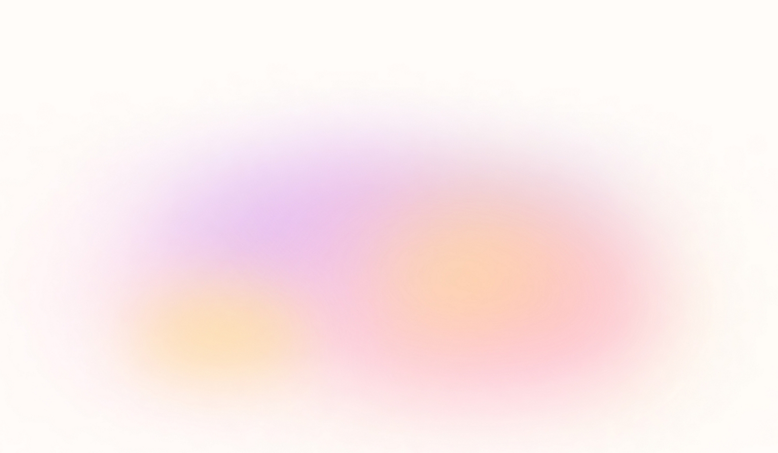 A blurry image featuring blended pastel colors including purple, orange, and pink on a white background.