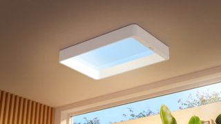 The Philips Skylight attached to a home ceiling mimicking a blue sky