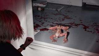 Grace looks down at a tiny version of the Licker, thanks to a Requiem mod that shrinks enemies.