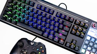 The Corsair Galleon 100 SD lit up with the Stream Deck side panel turned on and with various icons.