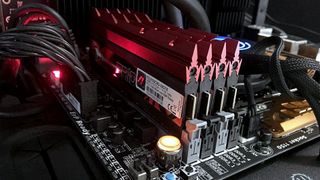 A close-up photo of a set of four DDR3-SDRAM DIMMS, installed in a motherboard
