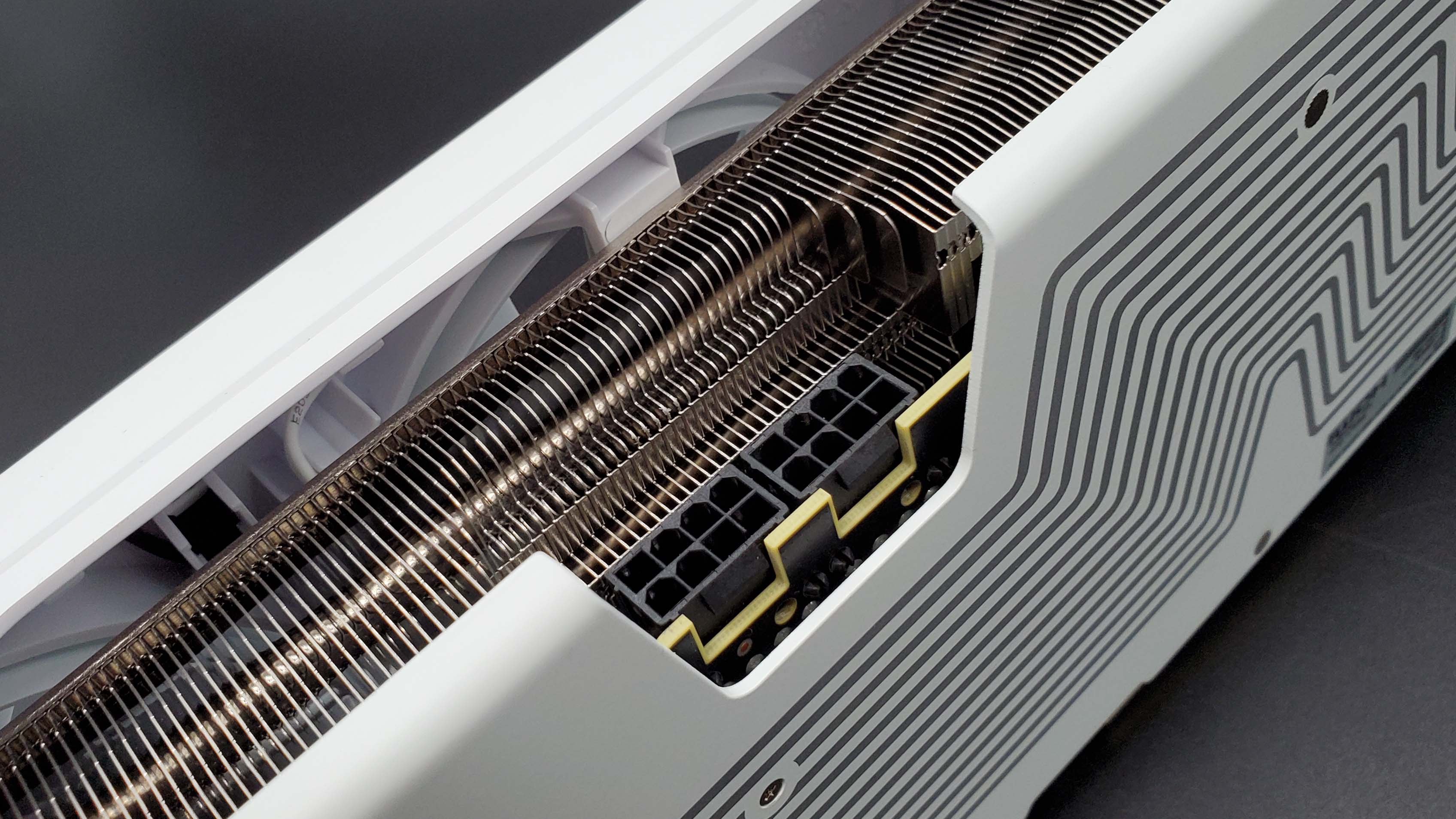 XFX Swift Radeon RX 9070 OC graphics card on a grey background with a gradient