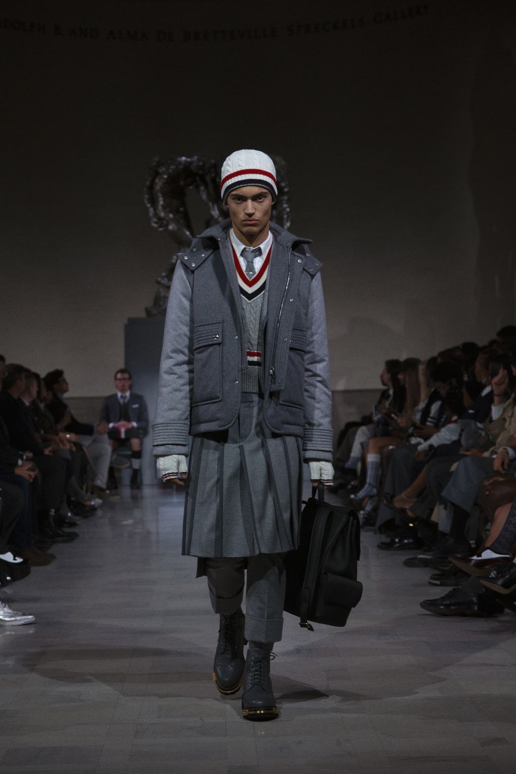 Image may contain Clothing Coat Adult Person Footwear Shoe Accessories Bag Handbag Face Head and Fashion