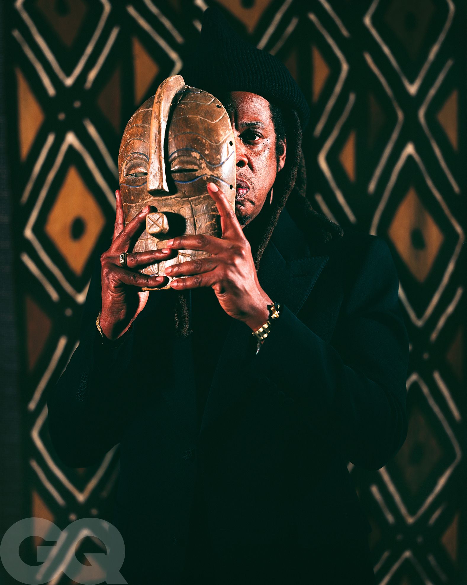 Image may contain JayZ Photography Face Head Person Portrait Adult Clothing Glove Body Part Finger and Hand